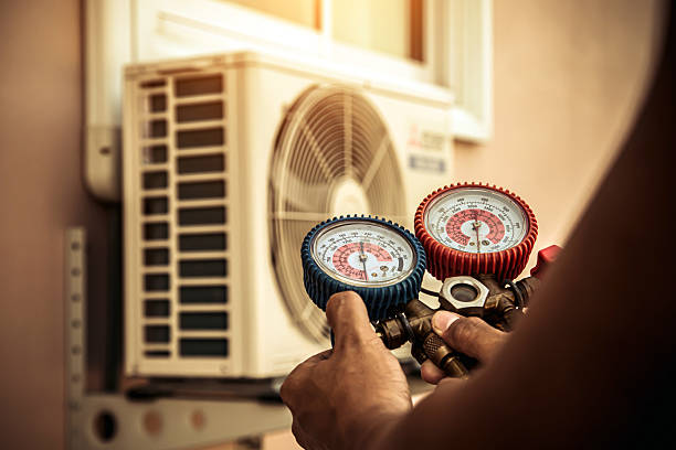 Professional Heat Pump Repair technician working in Somerville, MA